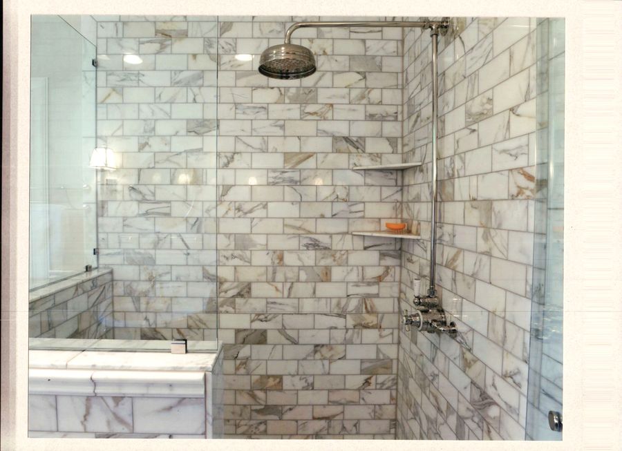 Calacatta marble subway shower and tub deck with nickel fixtures